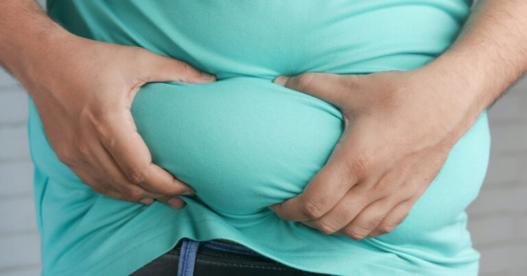 a person holding their stomach