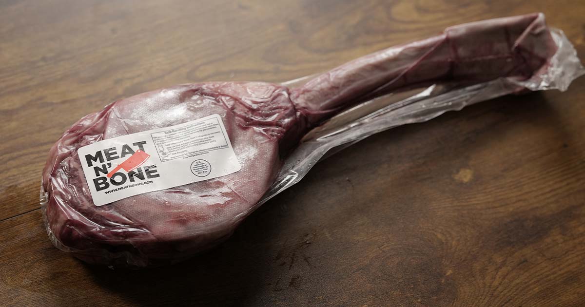 Meat N' Bone – Large Tomahawk steak in packaging on table